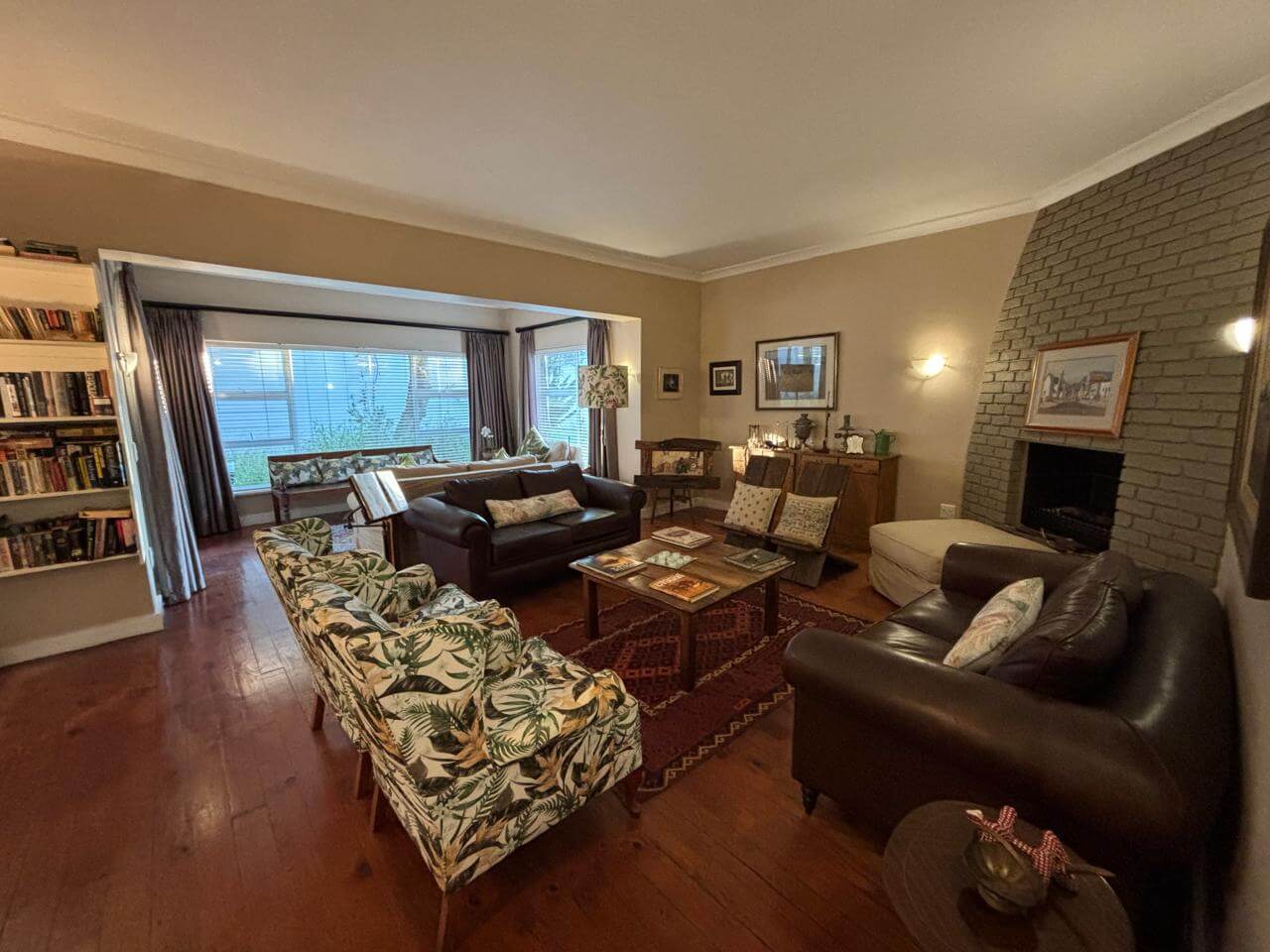 Guest lounge with DVD library and bookshelf